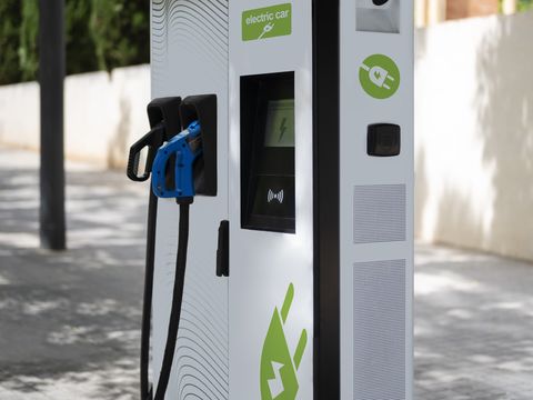 DC fast charger at a landscaped commercial property