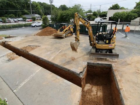Yard excavation for charging infrastructure at a large lot